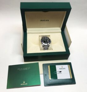 Rolex Batman watch in box with papers. Serial number 976763, model 126710BLNR.
