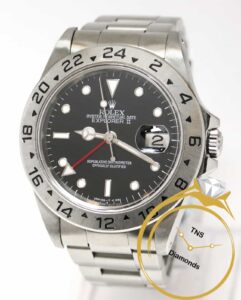 Rolex Oyster Perpetual Date Explorer II watch with a black dial and stainless steel band.