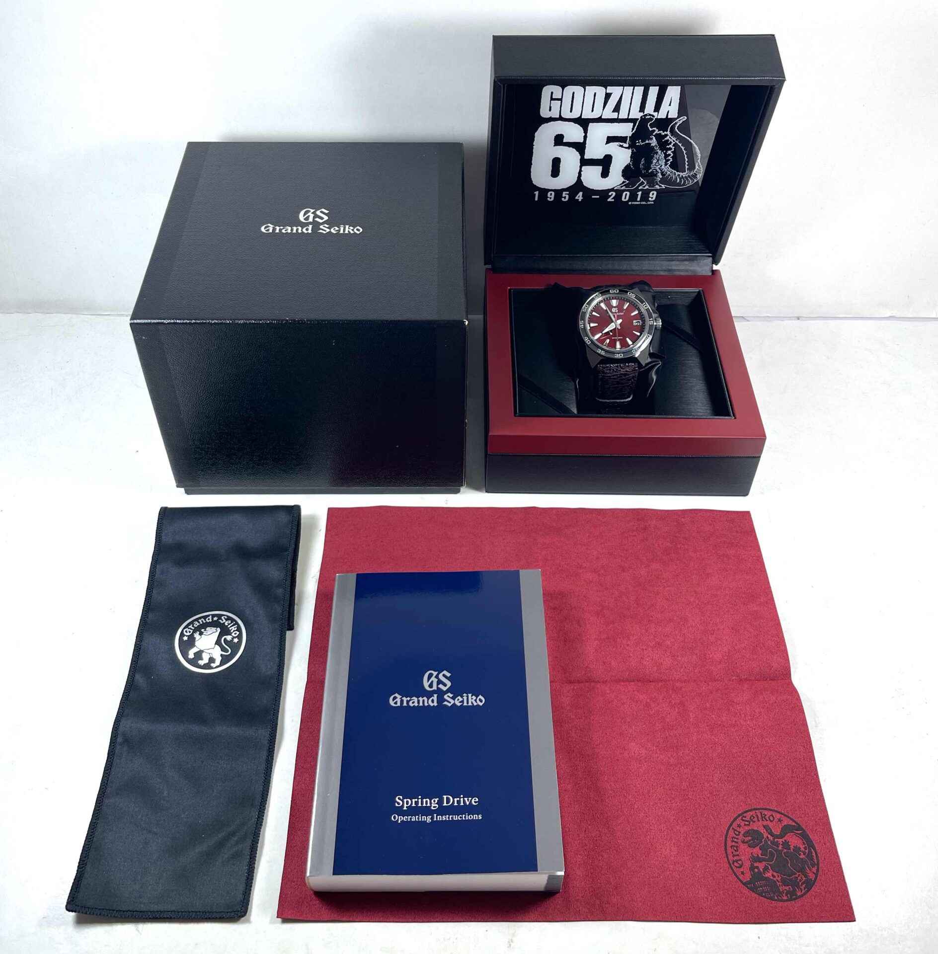 Grand Seiko Sport Collection Godzilla 65th Anniversary Edition SBGA405 Red  Dial 44.5mm Titanium | TNS Diamonds Philadelphia