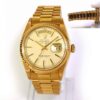 Vintage 1972 Rolex 18k Rose Gold Day Date President 1803 36mm watch face showing the day and date.