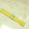 Jacob & Co yellow polyurethane watch band at 22mm on a marble surface.