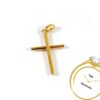 Simple 18k yellow gold religious cross pendant charm on white background.