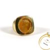 Elizabeth II coin ring. Close-up of 14k gold cameo ring featuring Queen Elizabeth II.