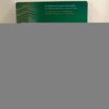 Rolex warranty card close-up: "This guarantee is valid only if dated...