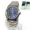 Rolex Air King Precision 34mm watch with blue Arabic dial, box, and papers.