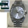 Rolex Datejust 41 126334 with a silver jubilee dial, box, and papers. Close-up of the watch face.