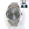 Rolex Oyster Perpetual 114300 39mm watch with rhodium dial, steel bracelet, box, and papers.