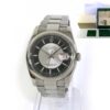 Rolex Datejust 116200 with black tuxedo dial, box, and booklets.