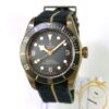 Tudor Heritage Black Bay Bronze watch with a slate grey dial and bronze case on a striped strap.