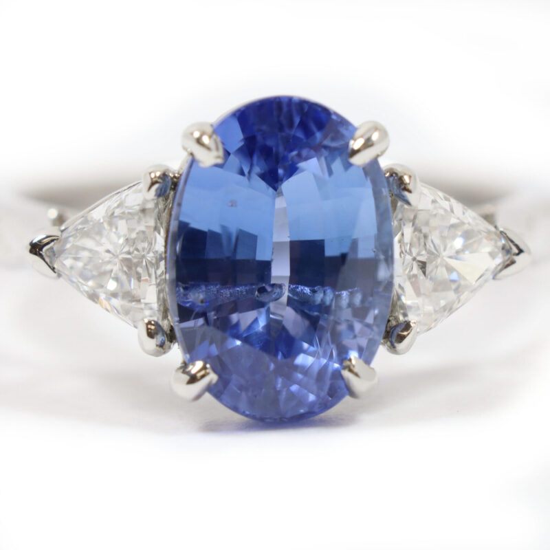 Oval Blue Sapphire Trillion Cut Diamond Three Stone Platinum Ring