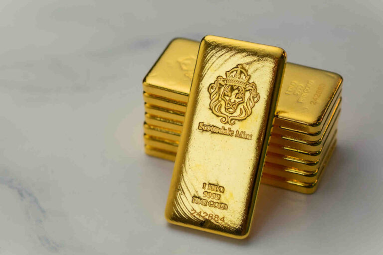 Gold bars stacked, 1 kilo 9999 fine gold from Scottsdale Mint.