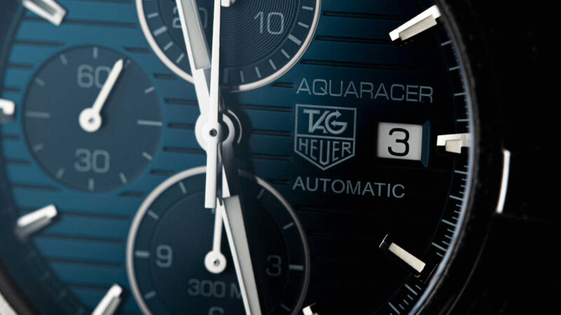 Entry-Level Luxury Watches Close-Up Of TAG Heuer Aquaracer Automatic Dial
