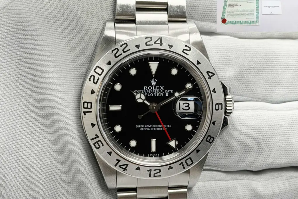 Rolex Explorer II 16570 with black dial, box, and papers, the watch this Rolex Explorer II 16570 movement guide covers.